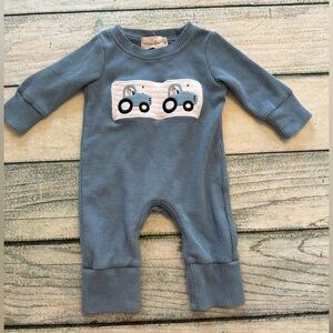 Marie Nicole Blue Smocked Tractors waffle knit romper. 3-6 months